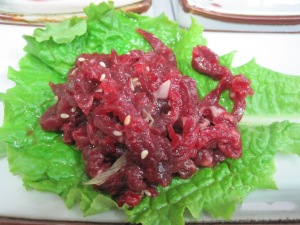 Eating some raw beef